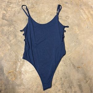 Body suit with side cut outs